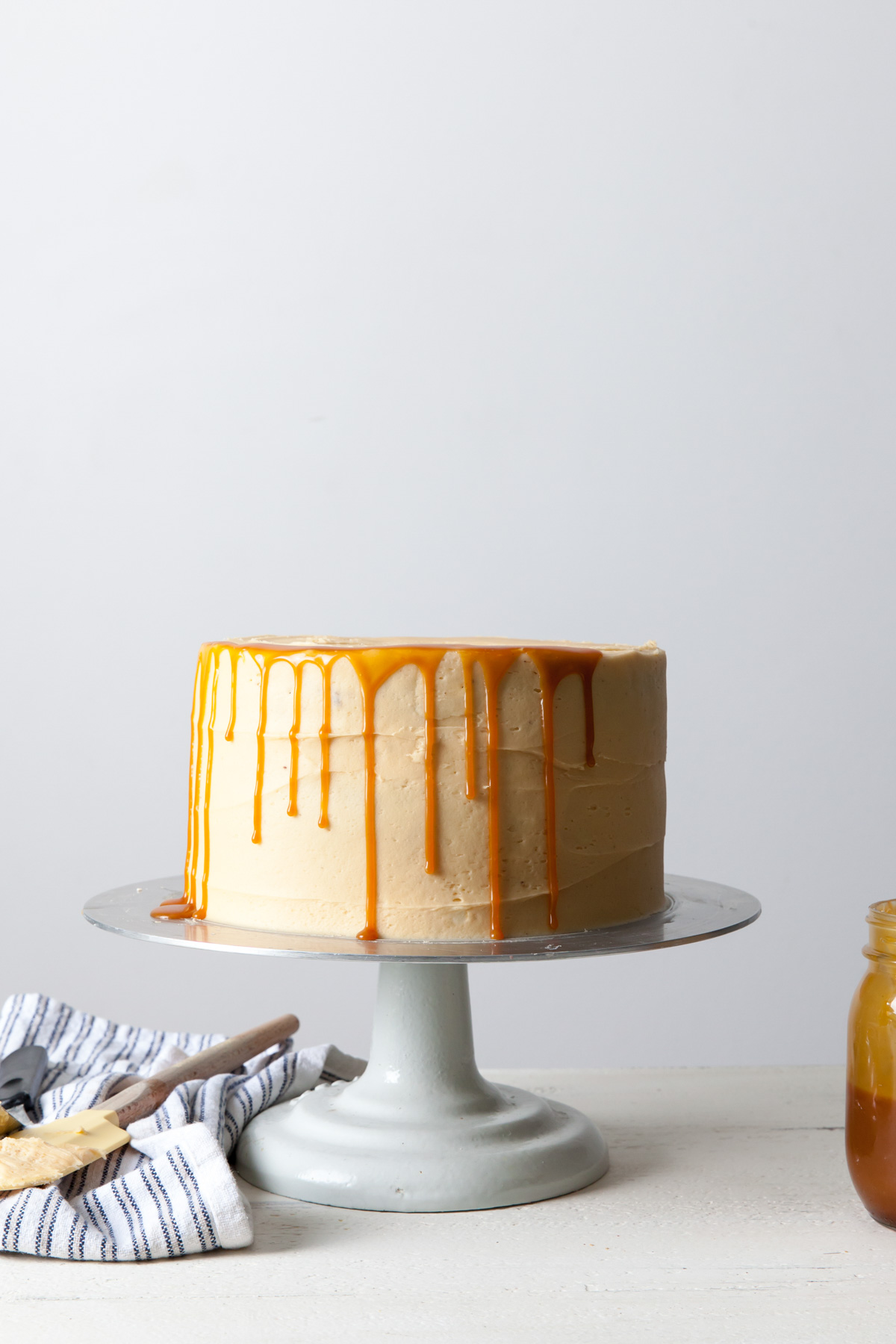 Adding caramel drips to a layer cake