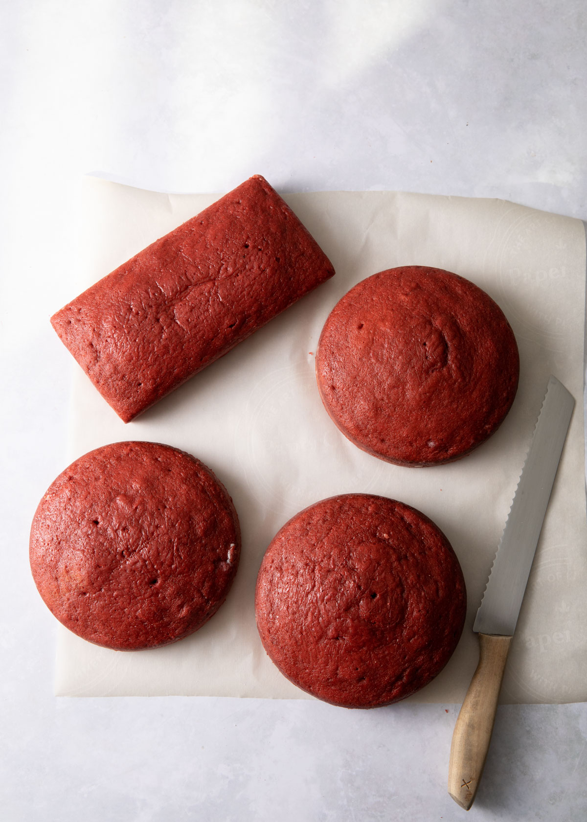 Baked red velvet cakes before trimming
