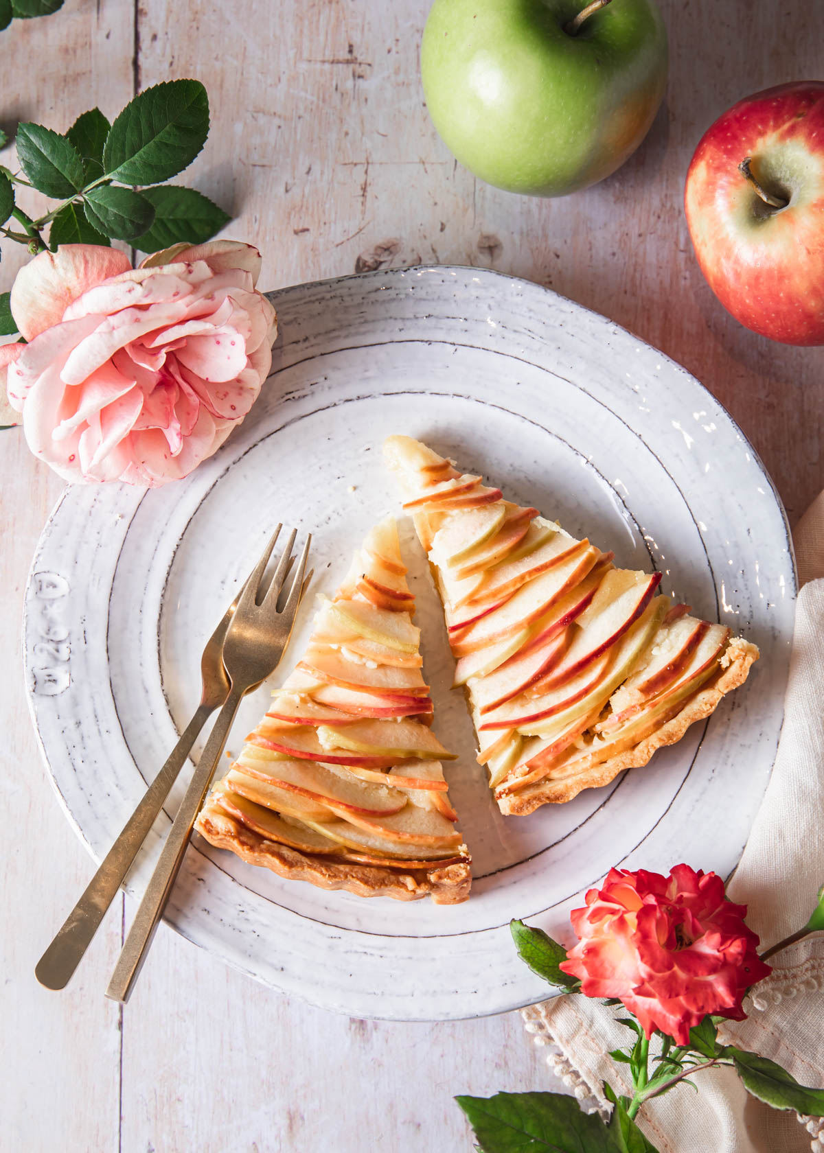 Two slices of apple tart on a plate