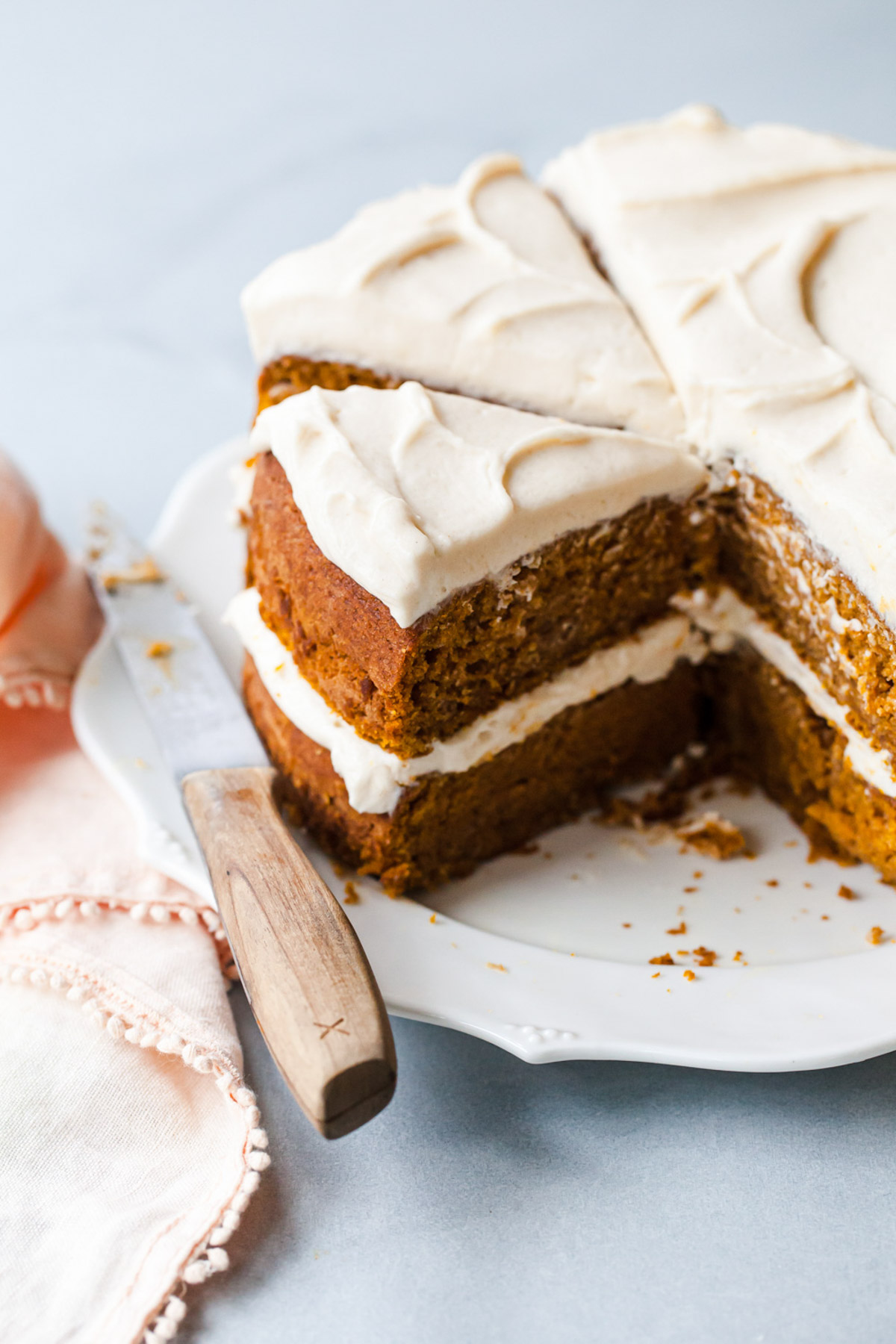 An inside look at a sliced pumpkin layer cake