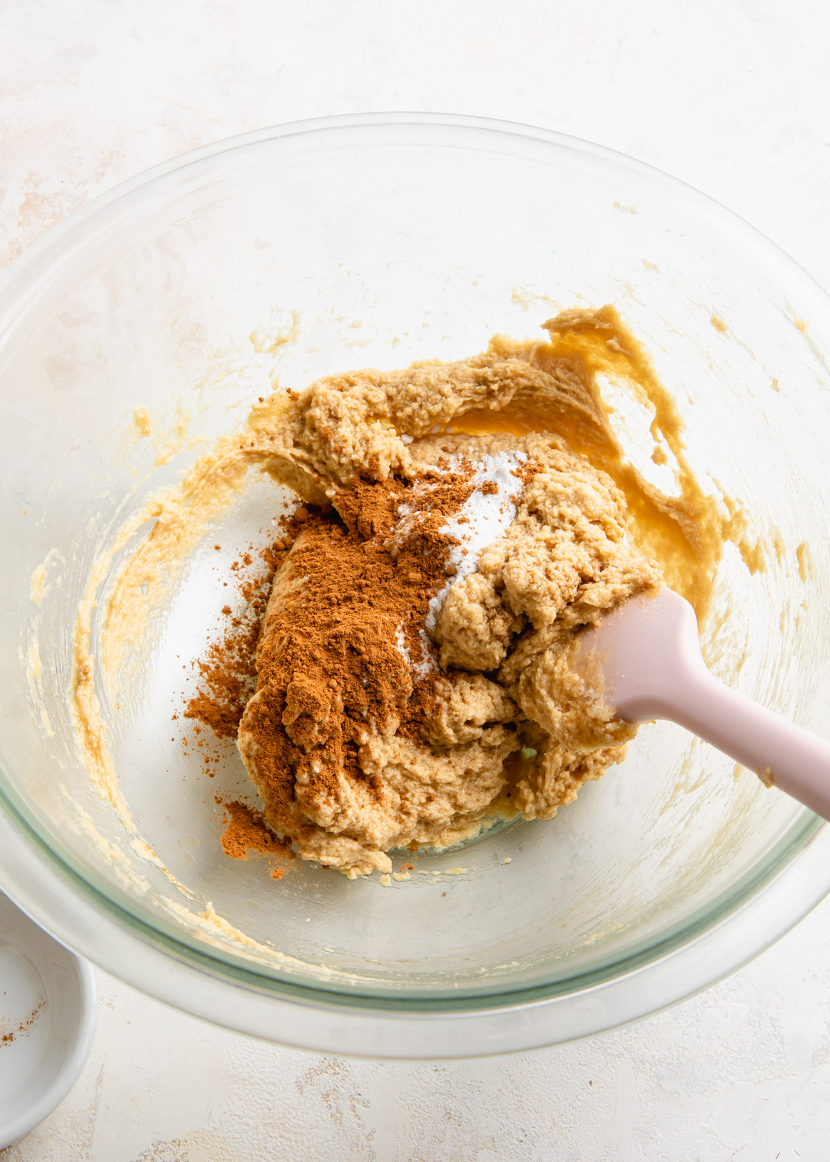 Adding the dry ingredients to cookie dough