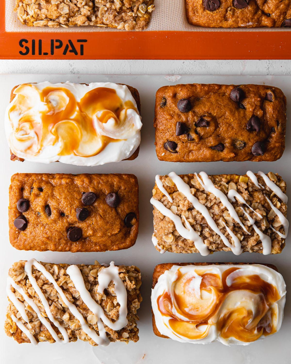 Mini pumpkin loaves with different toppings