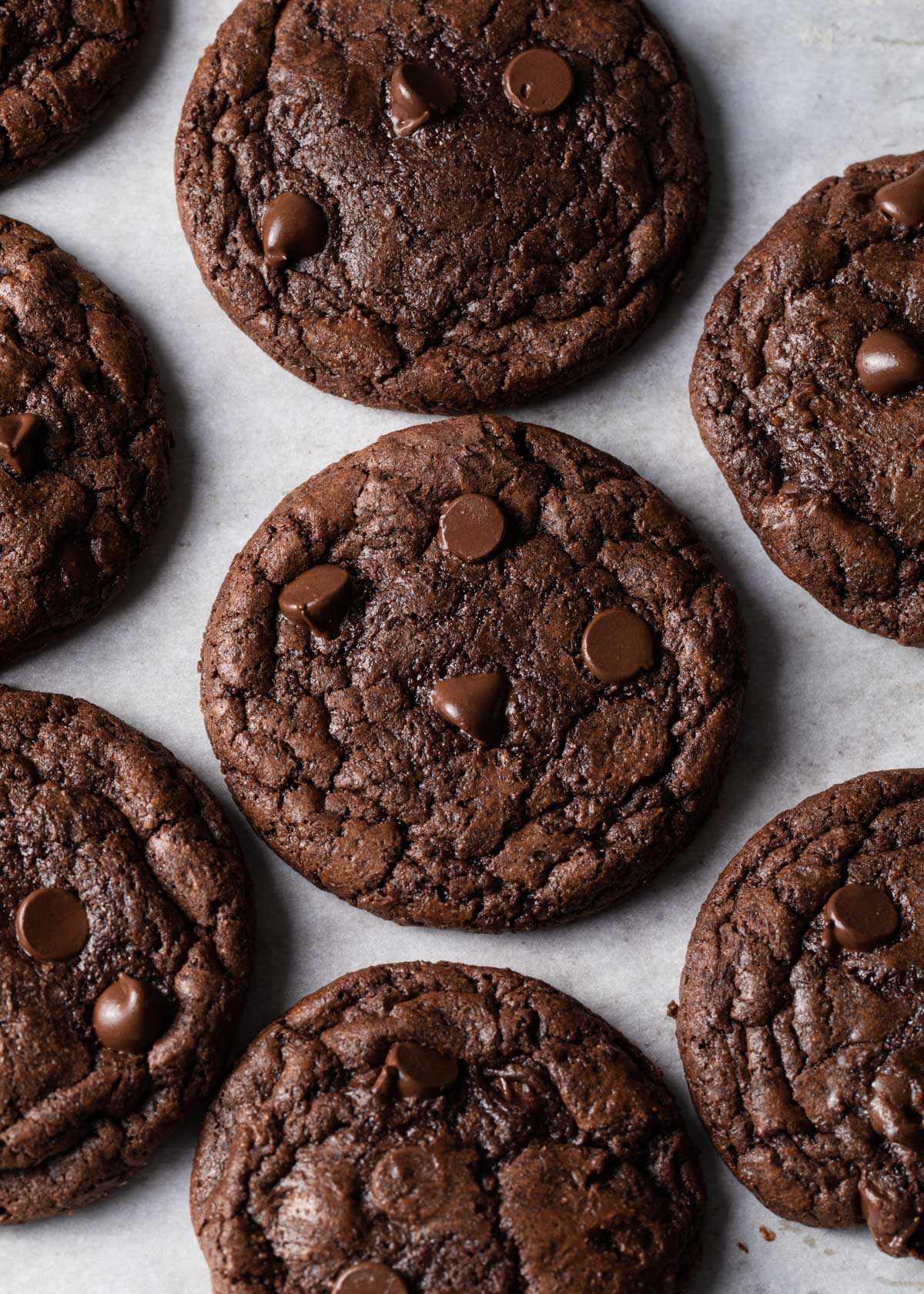 Baked double chocolate cookie on parchment paper