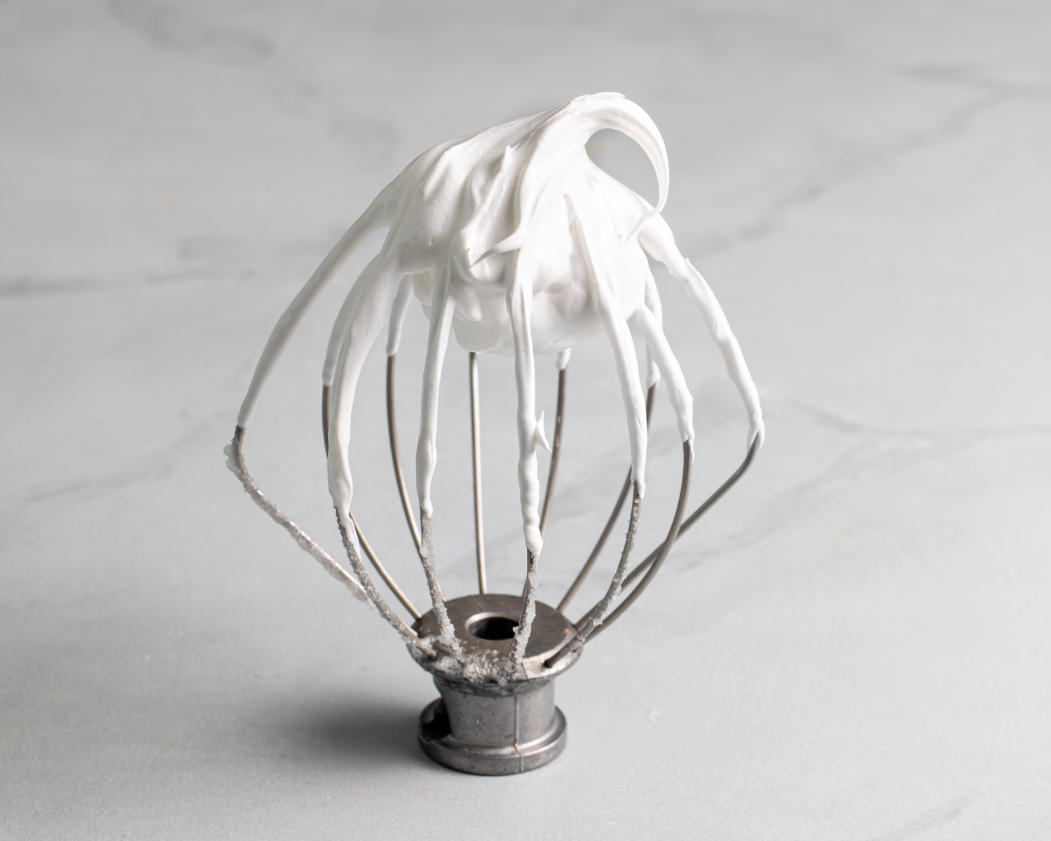 A whisk with soft peaks meringue
