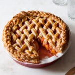 Baked apricot and raspberry pie with a lattice crust
