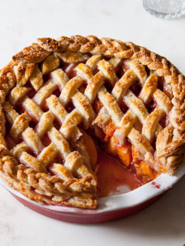 Baked apricot and raspberry pie with a lattice crust