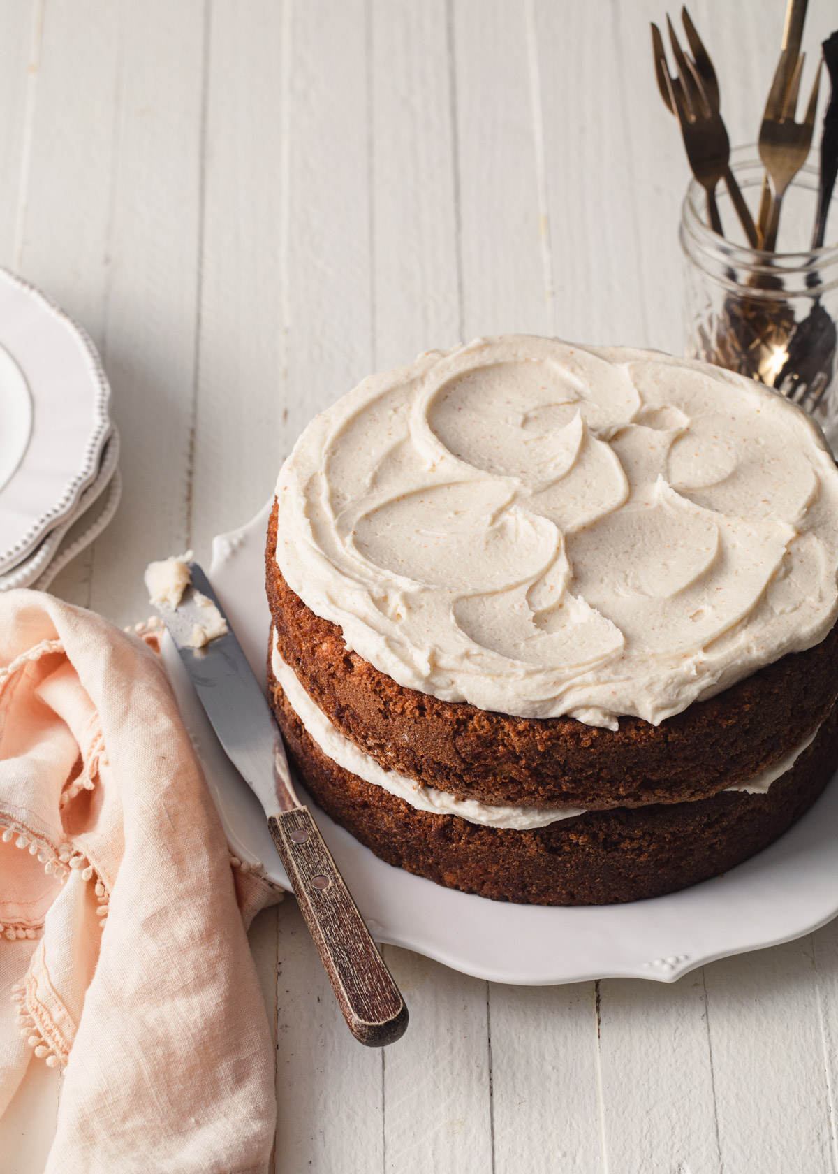 A two-layer carrot cake with brown butter frosting