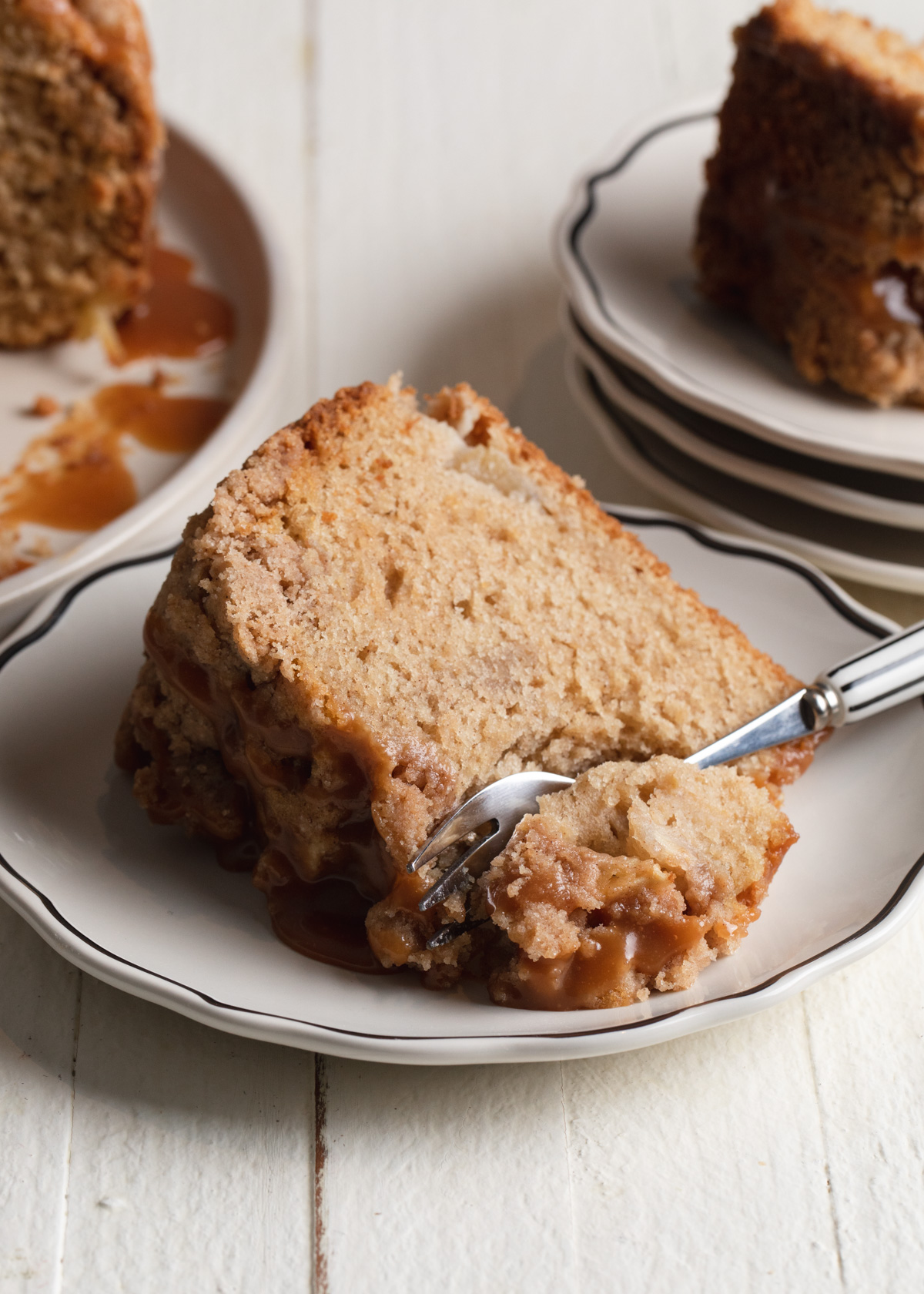 A thick slice of caramel apple coffee cake
