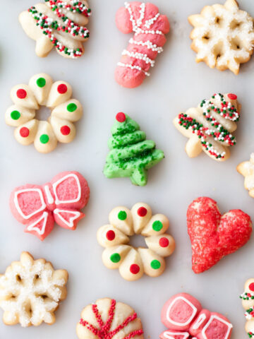 White, pink, and green Christmas spritz cookies