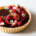 A classic chocolate tart with fresh berries on top