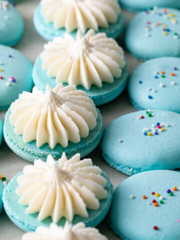 Close-up image of blue French macarons