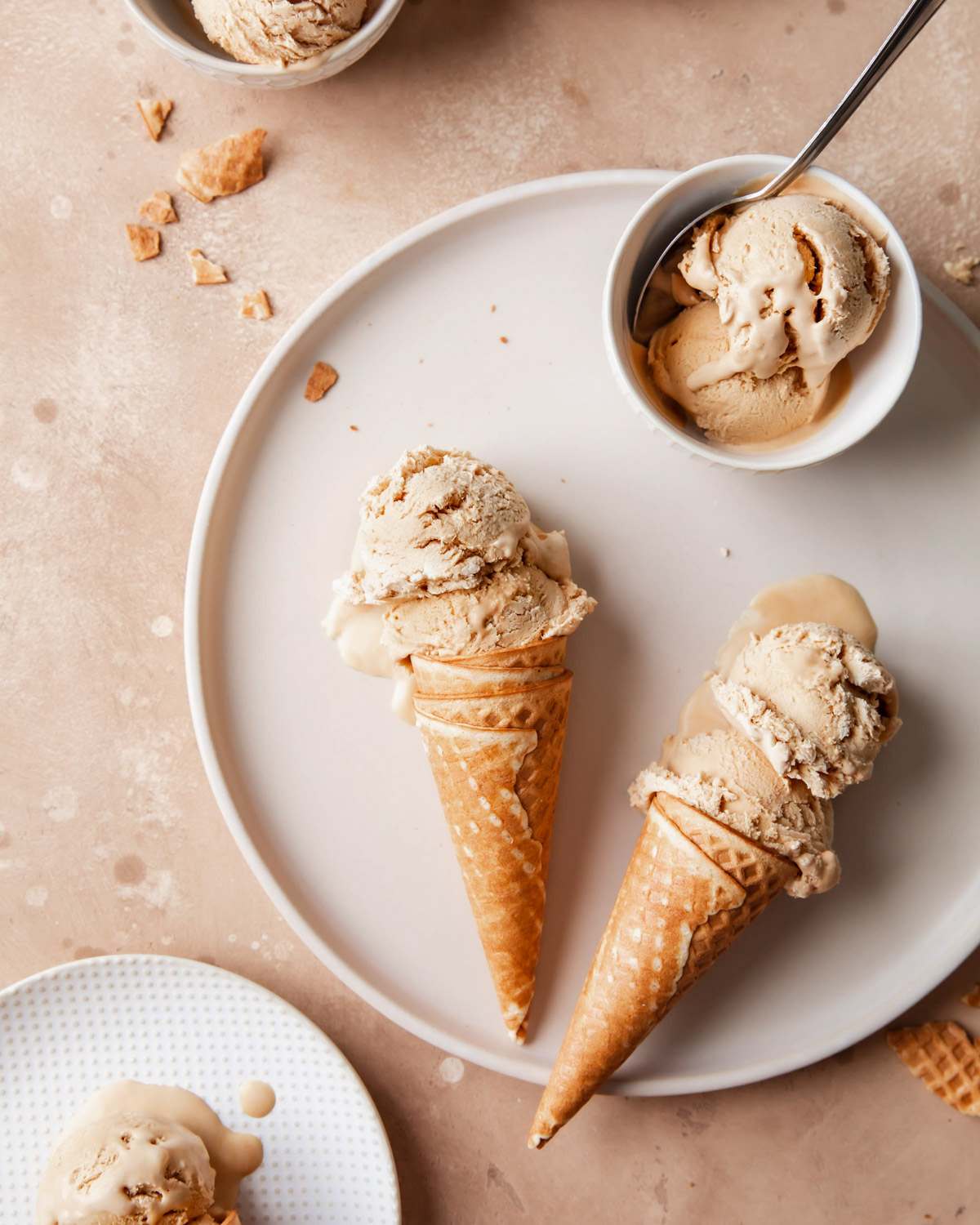 Two cones of dulce de Leche no churn ice cream on a platter