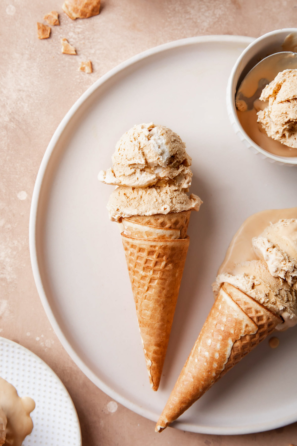 Two scoops of Dulce de Leche Ice Cream in a cone