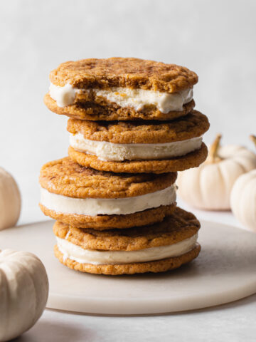 A stack of pumpkin snickerdoodle ice cream sandwiches