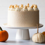 A pumpkin pie layer cake with whipped cream