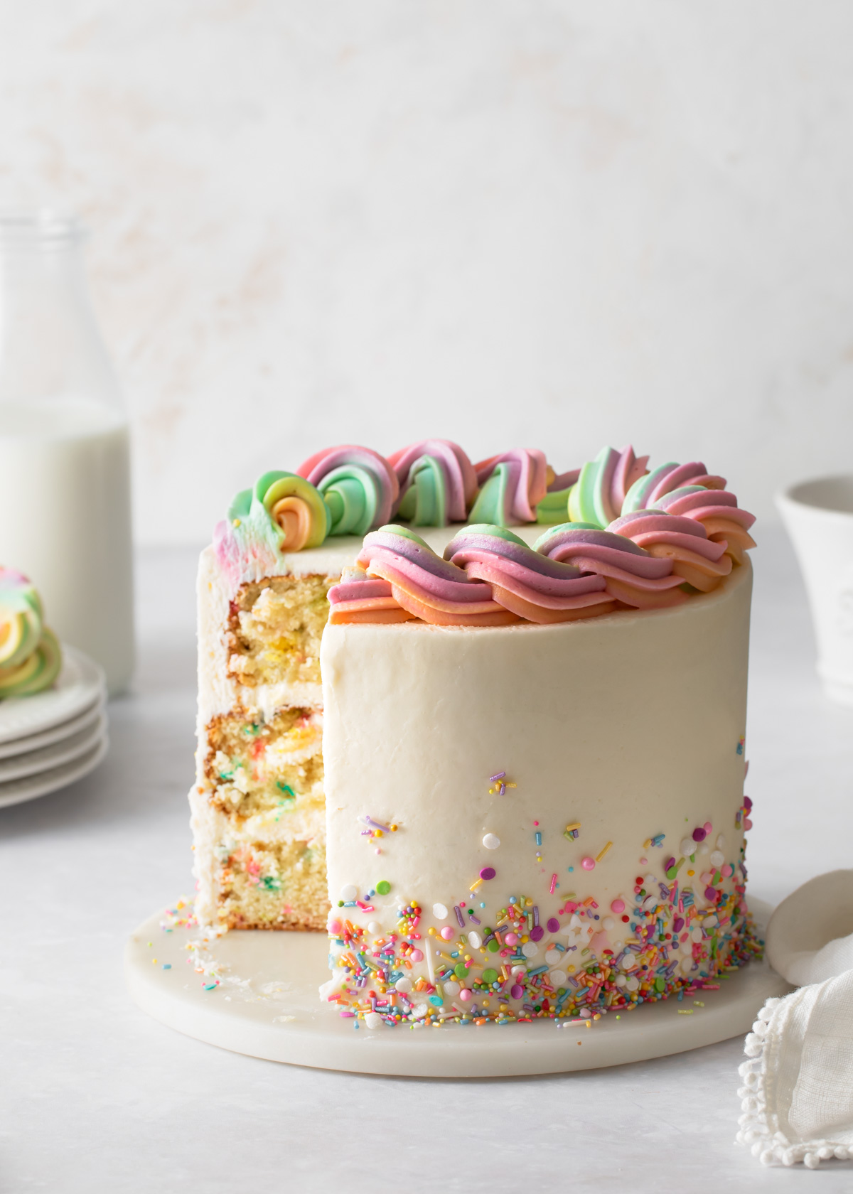 Rainbow Cake with Rainbow Frosting - SugarHero