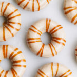 Baked pumpkin donut with caramel glaze on top