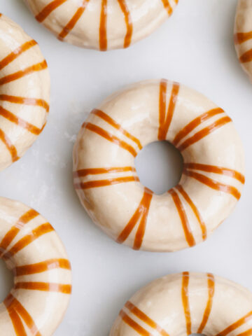 Baked pumpkin donut with caramel glaze on top