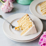 A slice of zucchini cake with goat cheese frosting