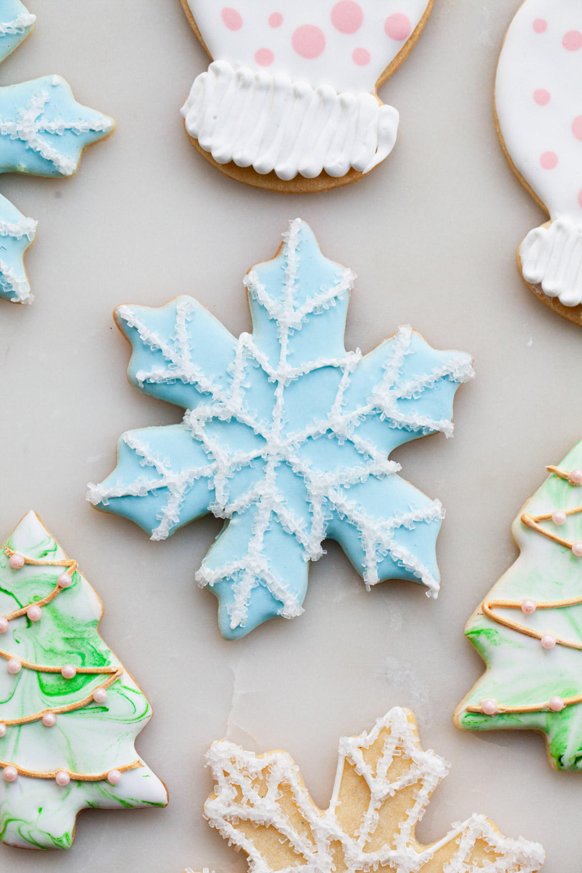 A royal icing snowflake sugar cookie