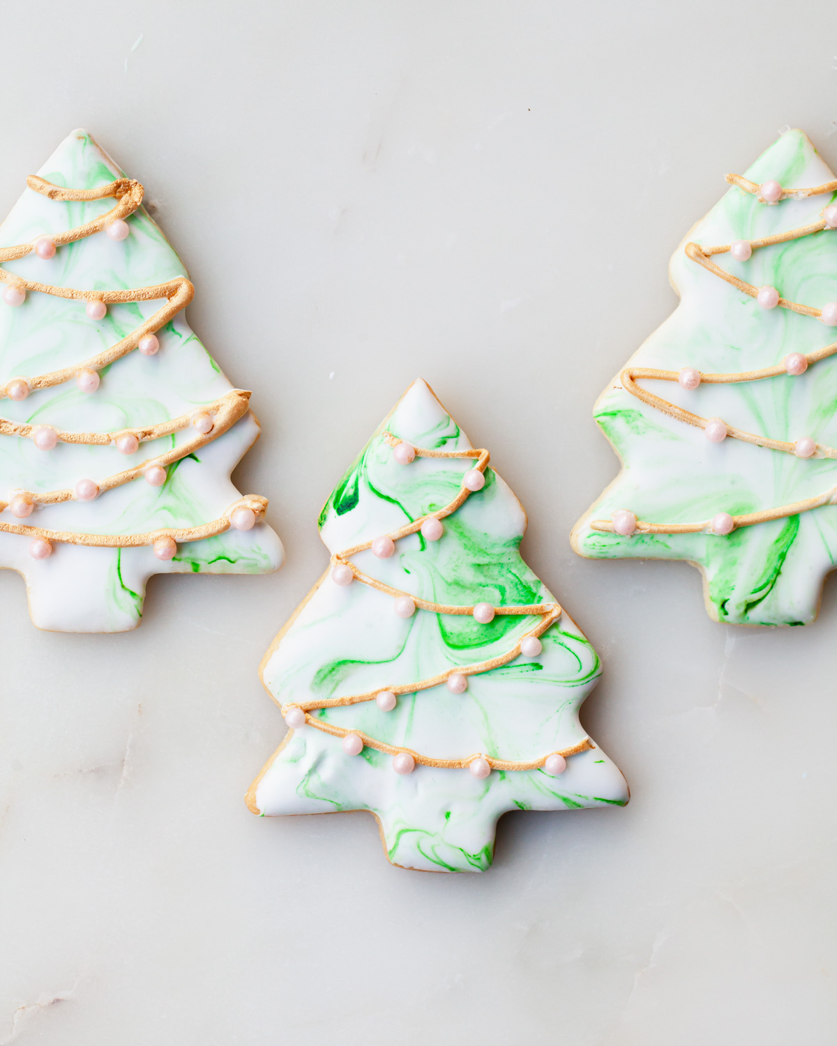 Marbled royal icing Christmas tree sugar cookies