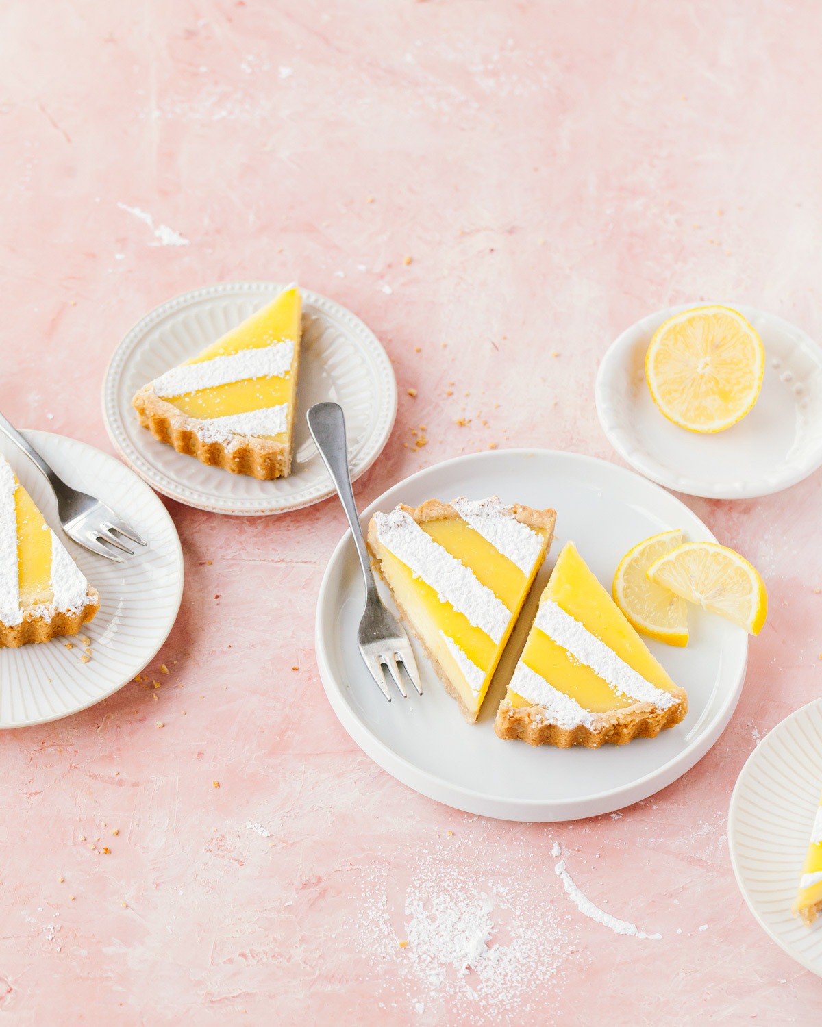Slices of lemon tart with powdered sugar on top