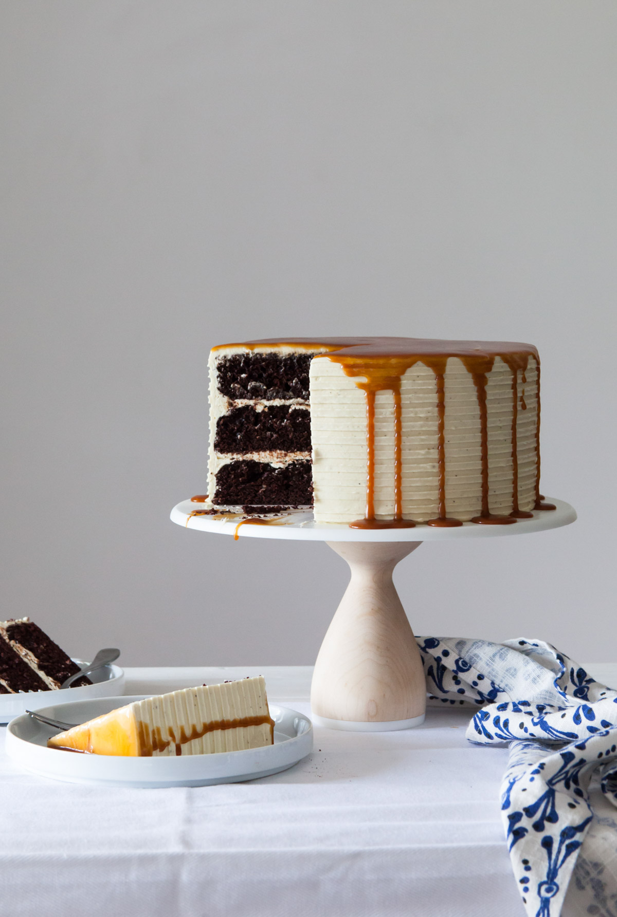 A three layer chocolate cake with earl grey buttercream and caramel sauce