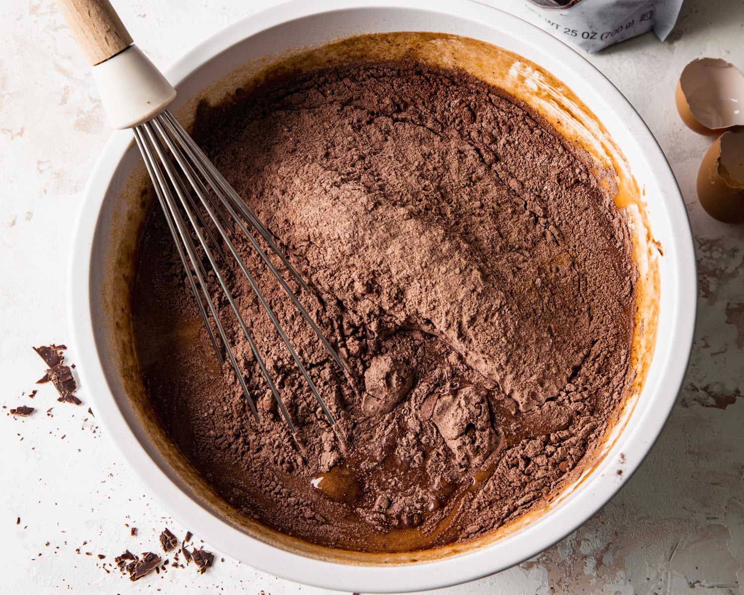 A bowl of chocolate brownie cake batter