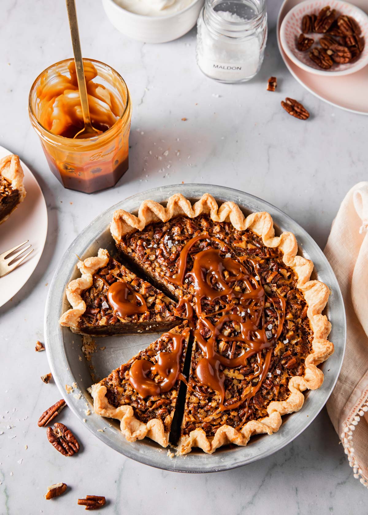 Pecan pie with salted caramel on top.