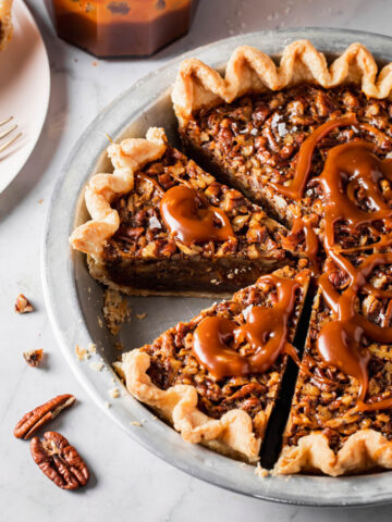 Pecan pie made without corn syrup with caramel swirled on top