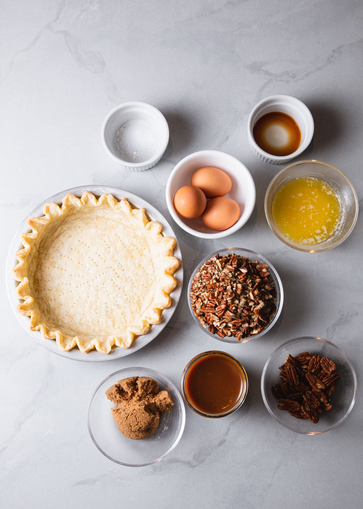 Ingredients in a caramel pecan pie made without corn syrup