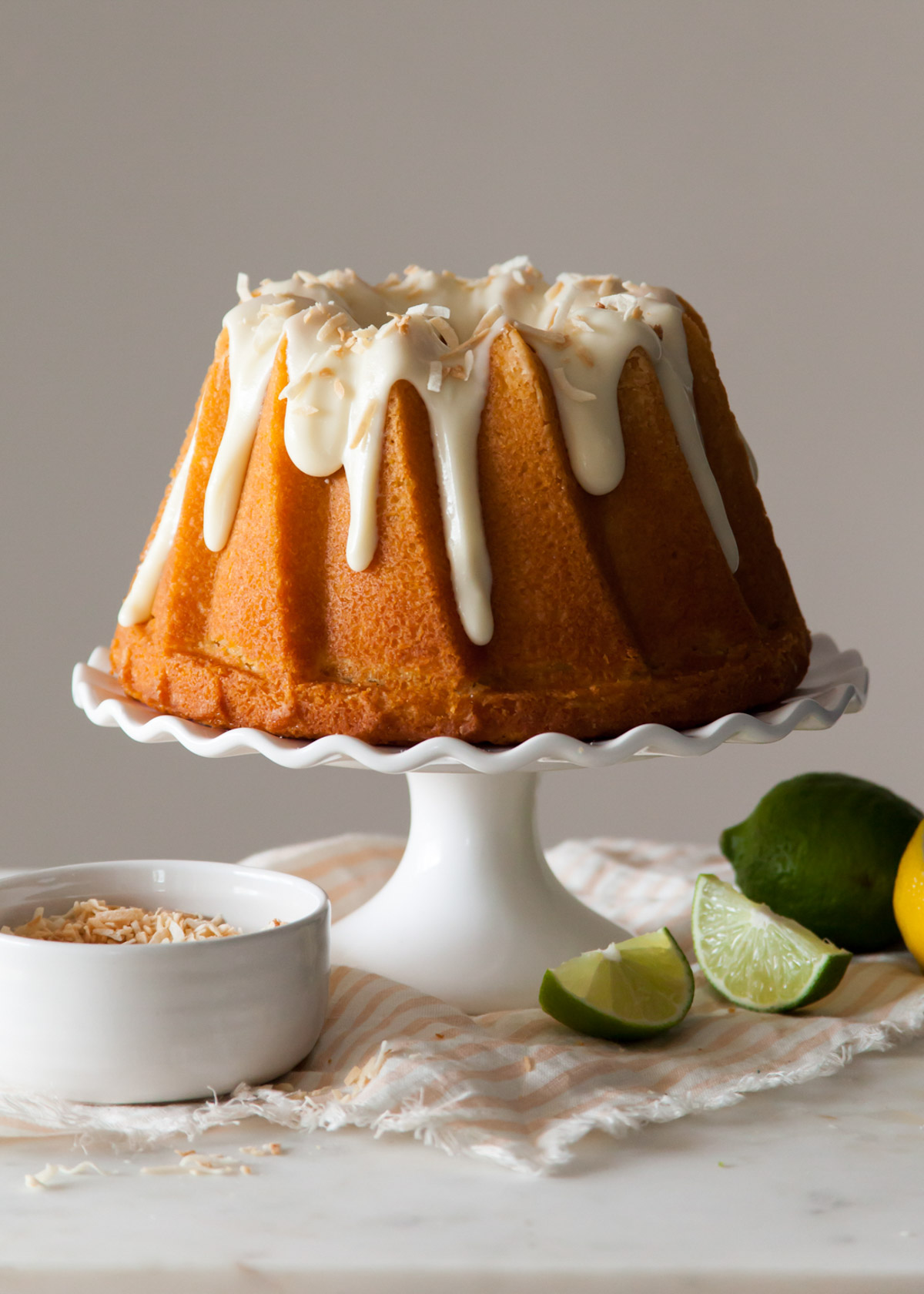 A lemon bundt cake with coconut icing.