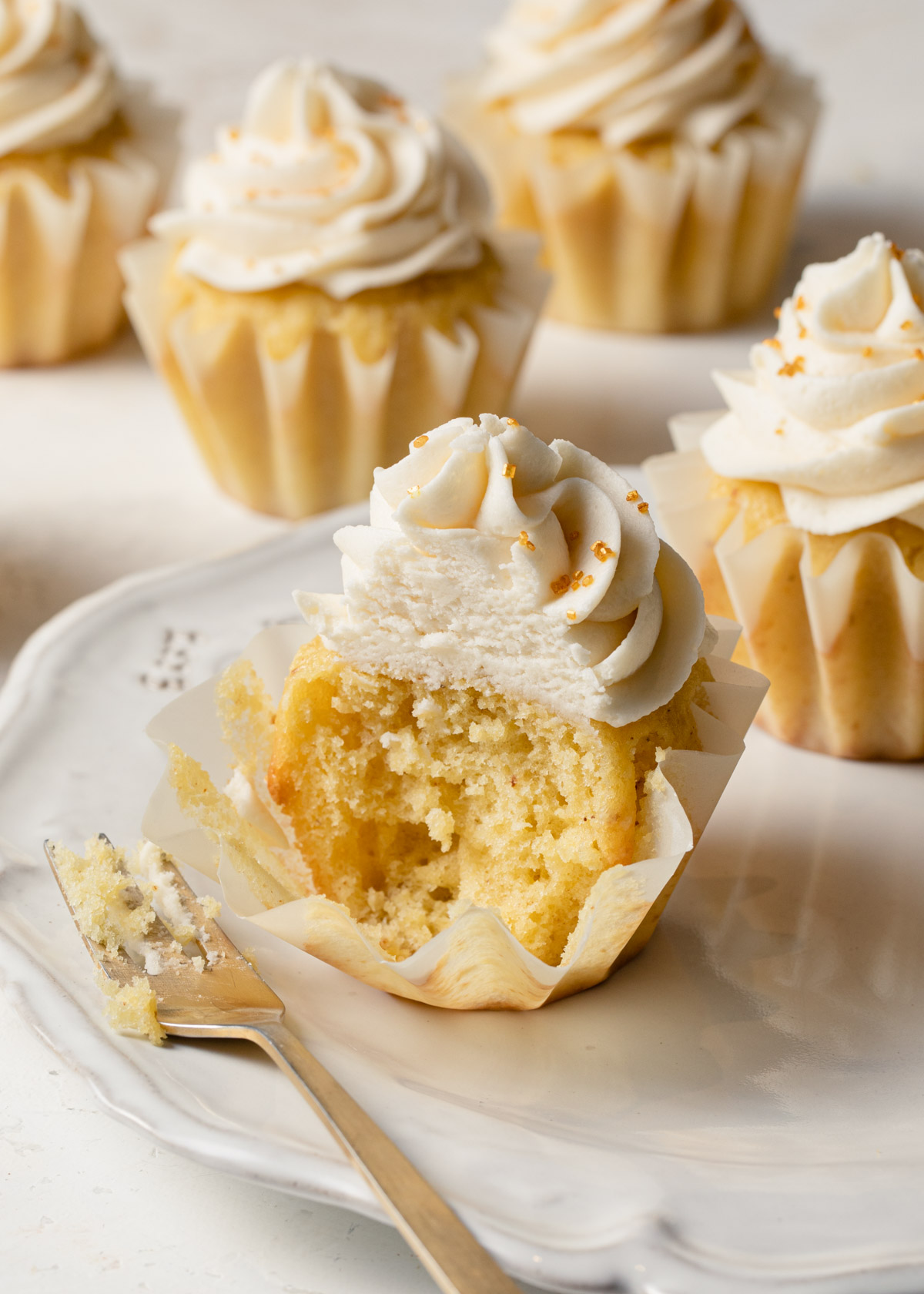 Brown butter cupcakes with fluffy whipped buttercream frosting swirled on top