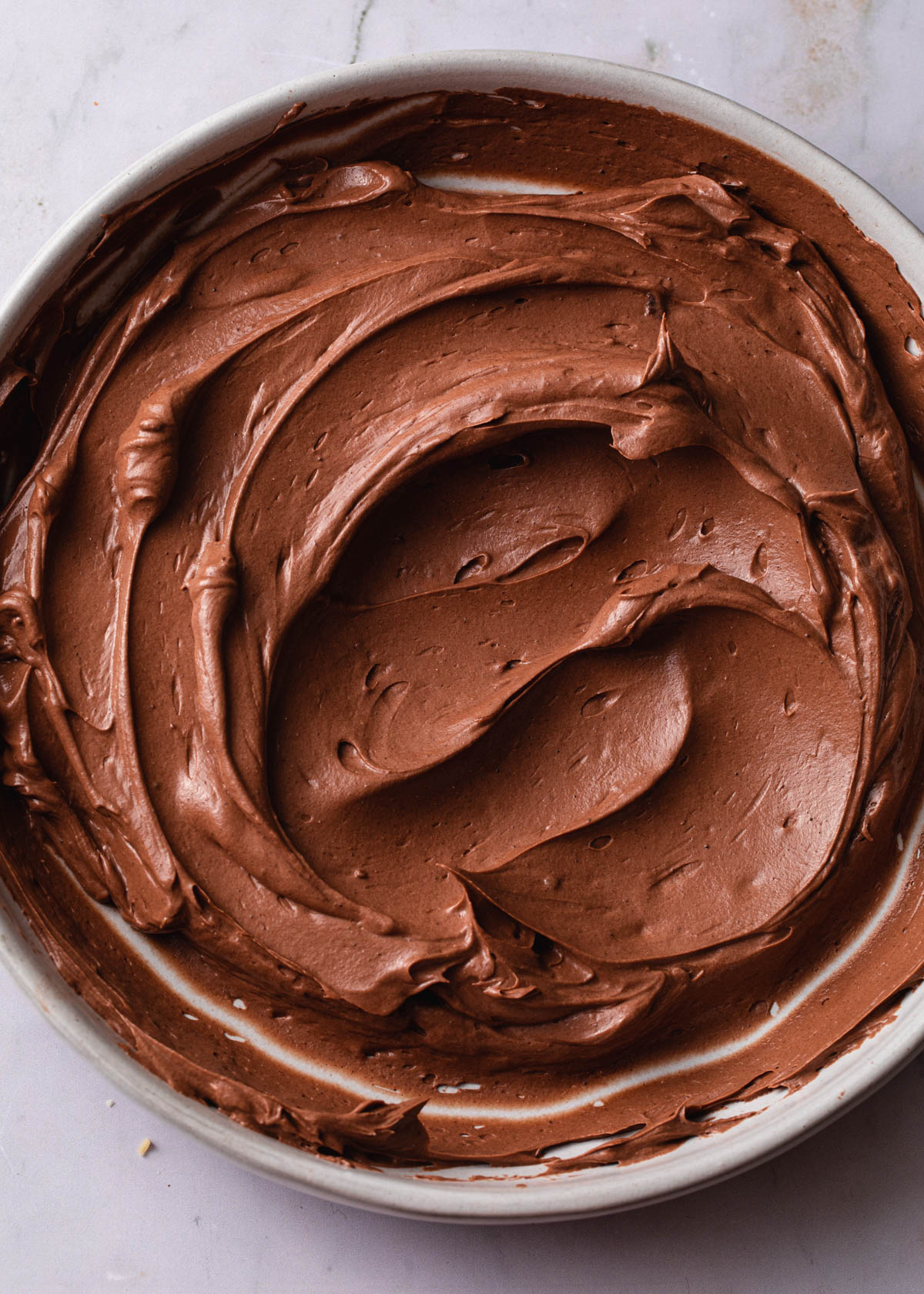 A bowl of creamy chocolate Nutella buttercream