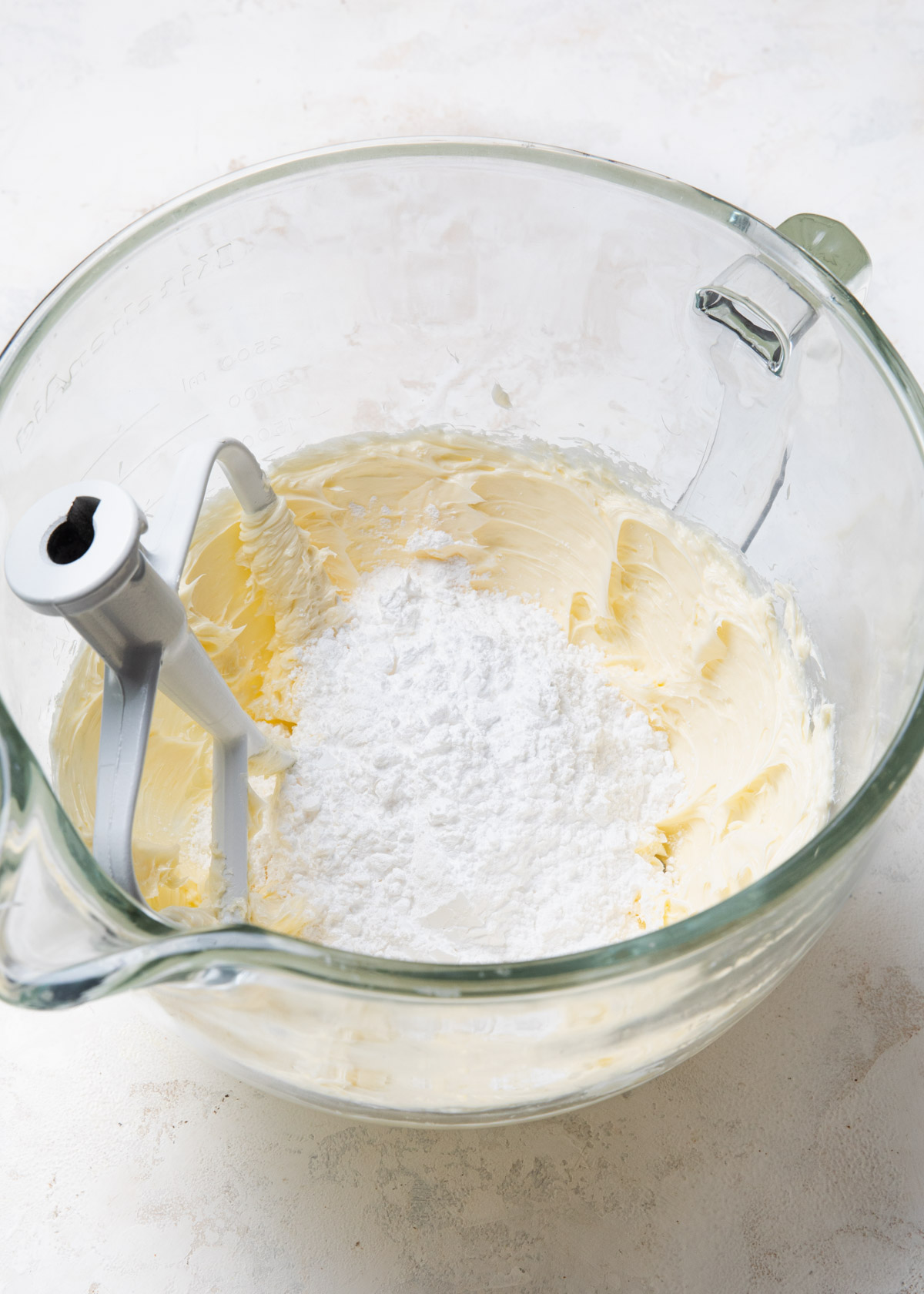 powdered sugar added to mixed butter for frosting