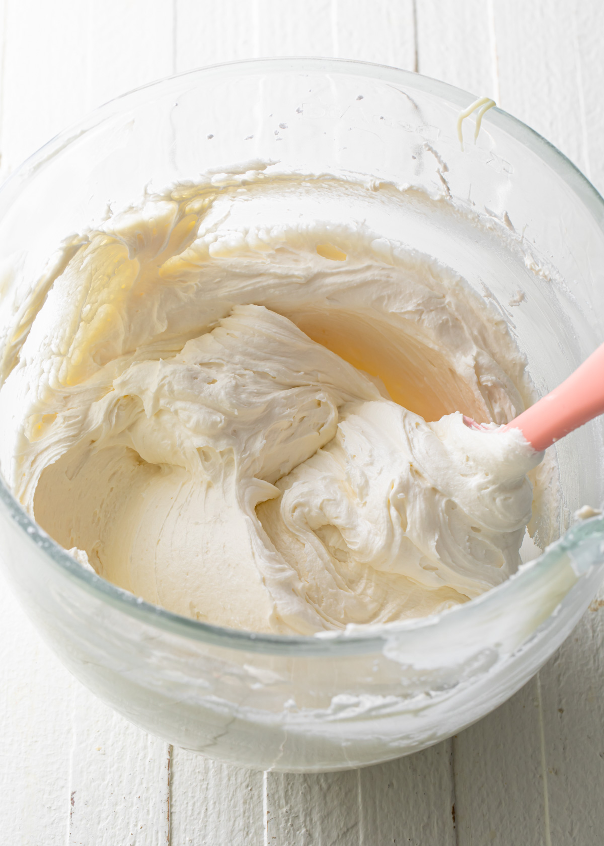 Whipped white chocolate frosting that is ready to spread onto cakes or cupcakes