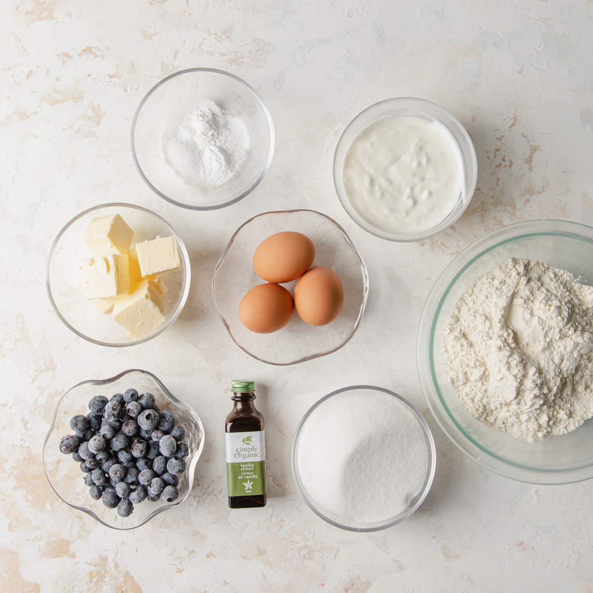 An overhead photo of the ingredients needed to make a blueberry pound cake