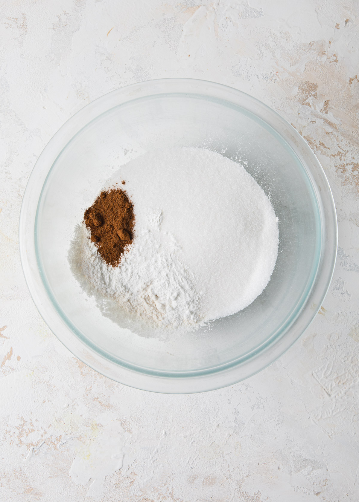 Mixing flour, sugar, instant coffee, baking powder, and salt in a mixing bowl