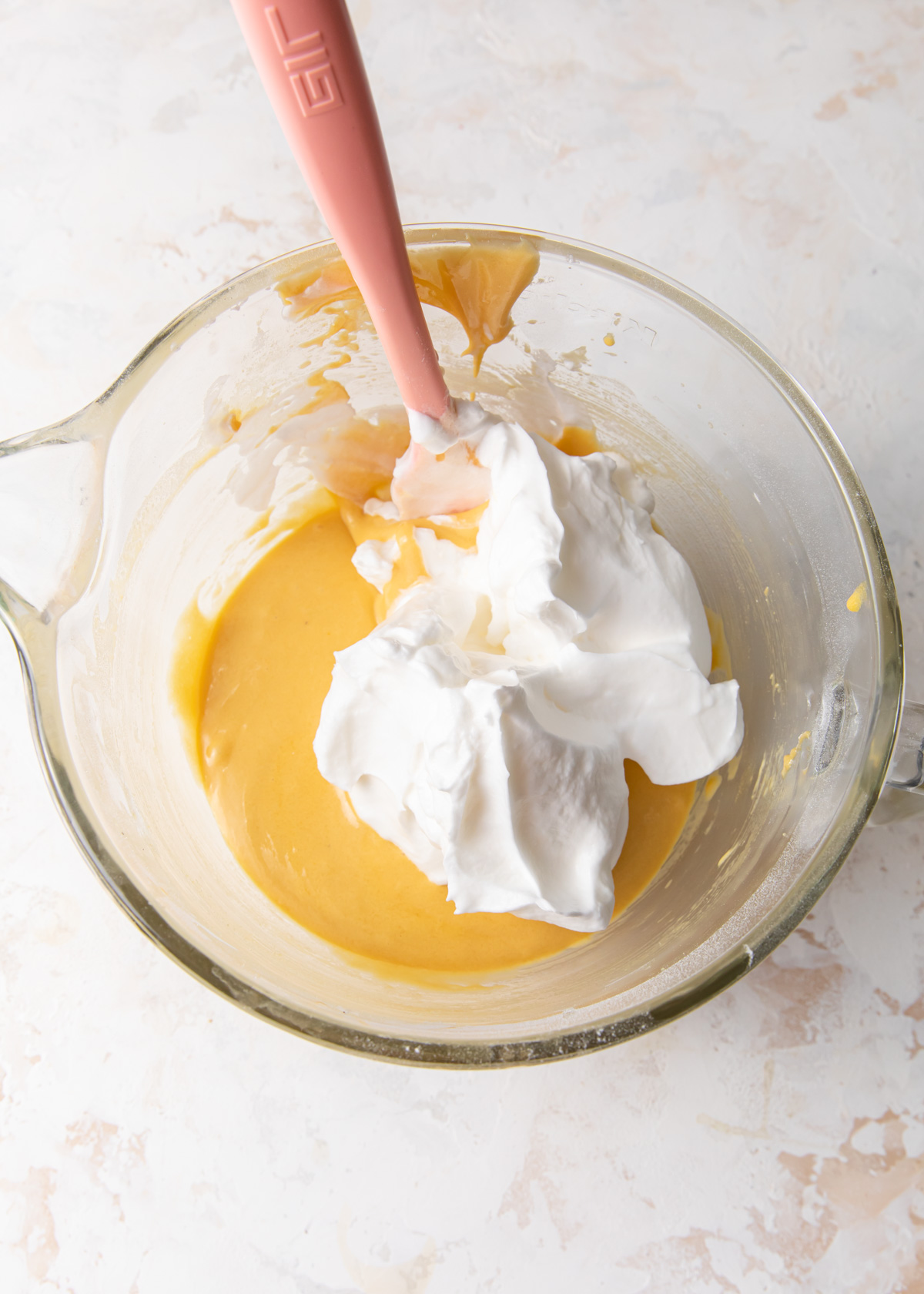 Adding egg whites to cake batter