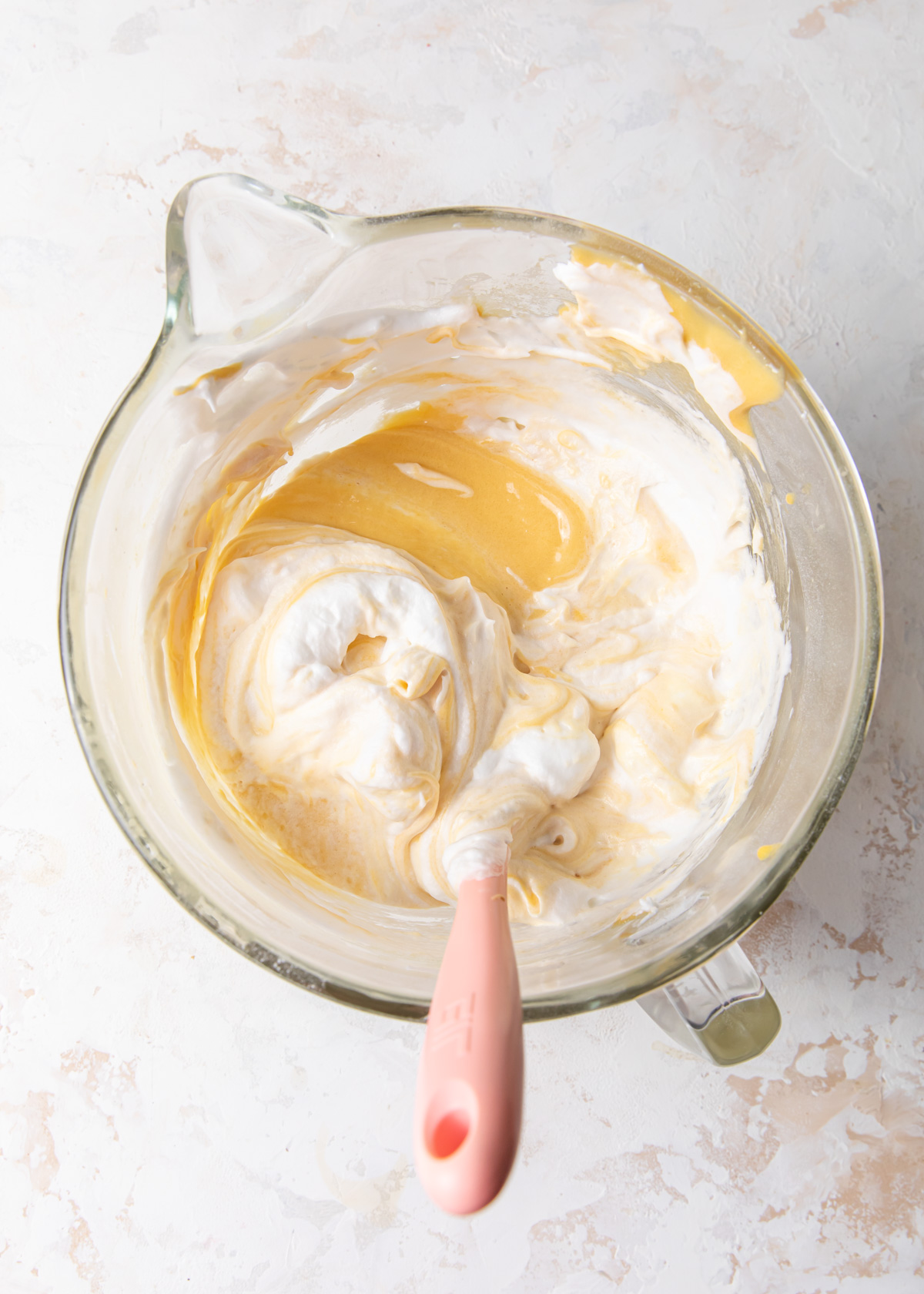 Folding egg whites into cake batter