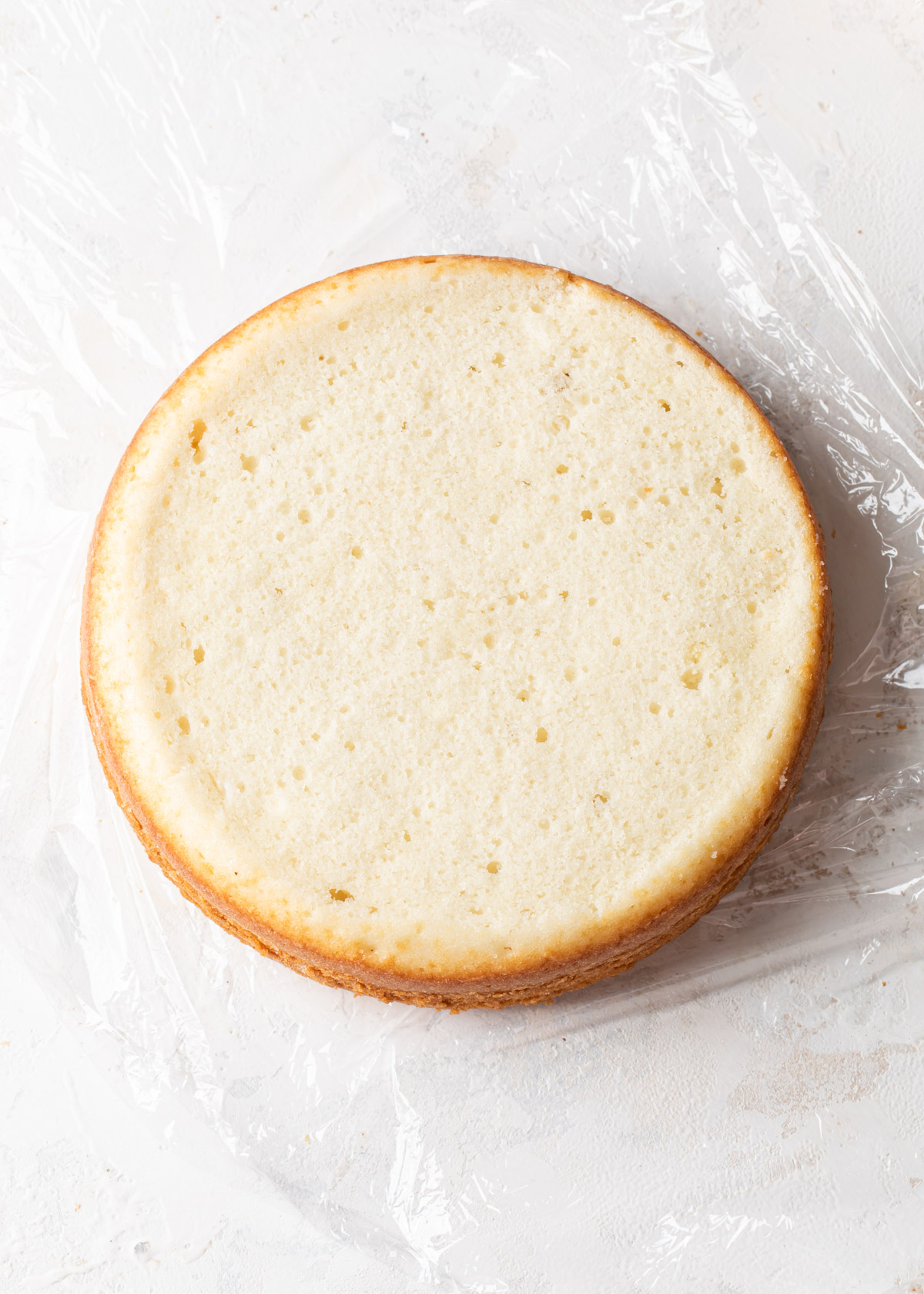 A close-up of the moist crumb of a white velvet cake
