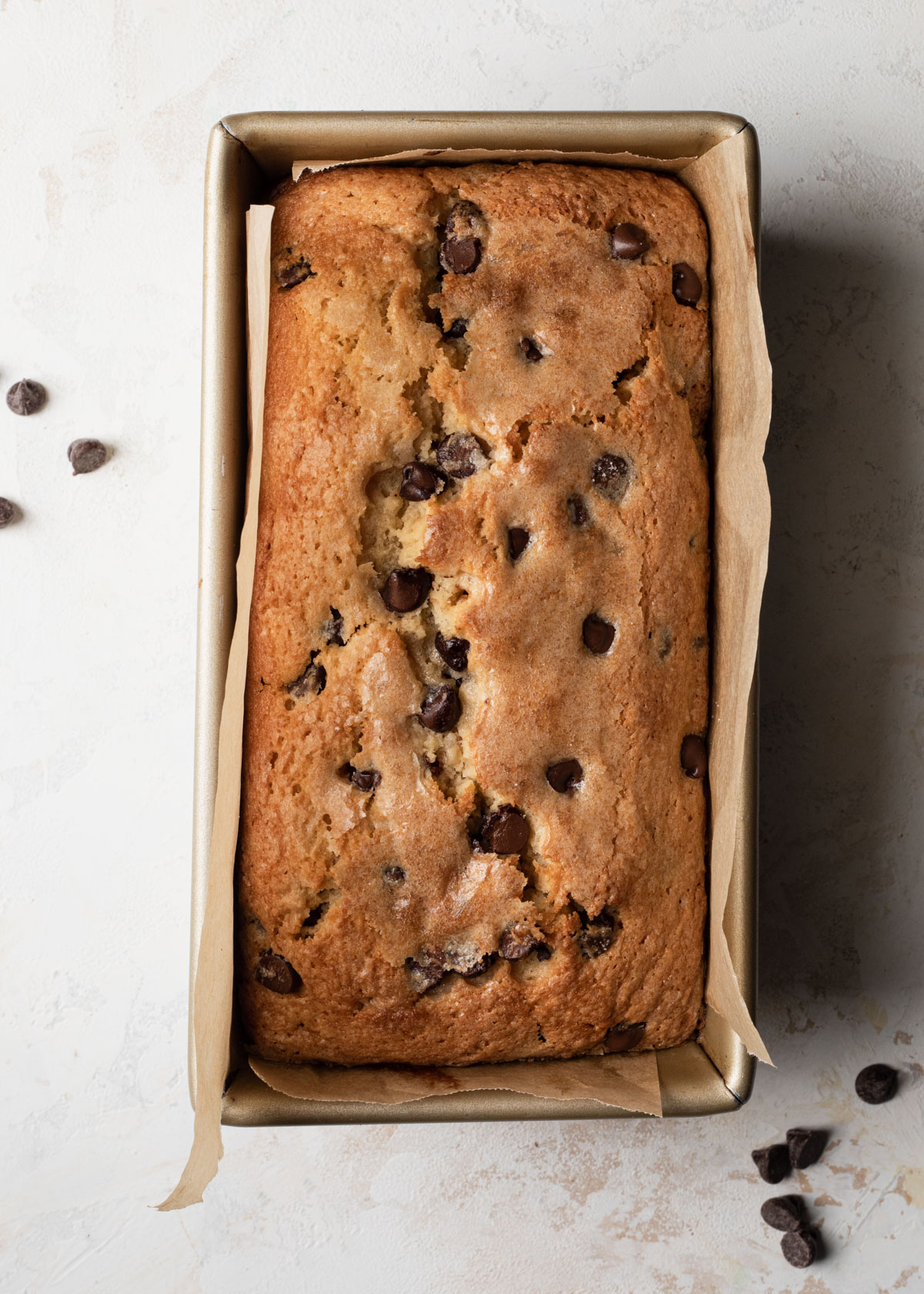 Pound cake baked in a loaf pan with chocolate chips
