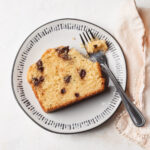 An overhead image of a slice of chocolate chip pound cake on a plate