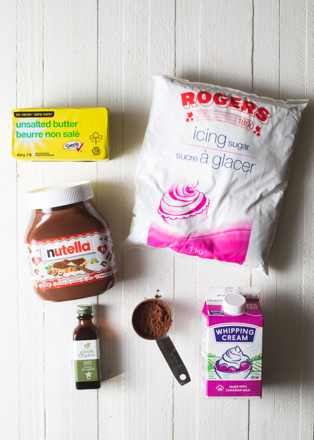 An overhead image of all the ingredients needed to make Nutella buttercream
