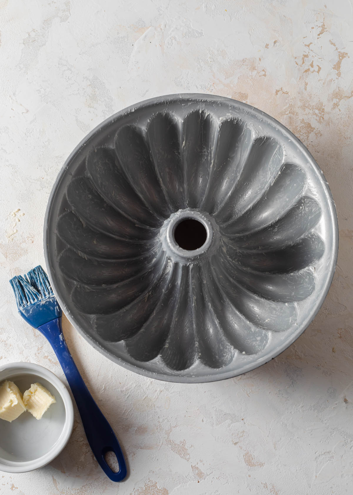 Bundt pan with butter smeared inside