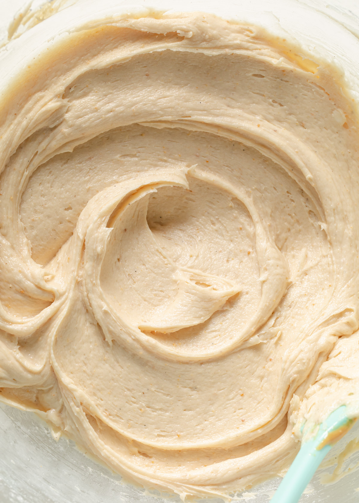 Swirls of creamy peanut butter cream cheese frosting