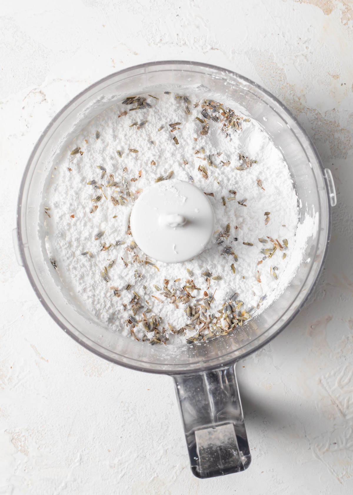 powdered sugar and dried lavender buds in a food processor