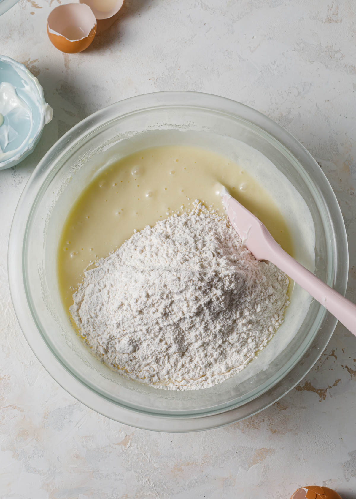 Folding flour into cake batter