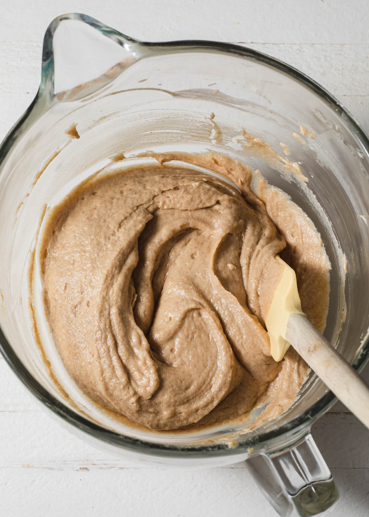 Buttermilk cake batter mixed in a glass bowl