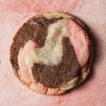 A close-up of a marble peppermint mocha sugar cookie